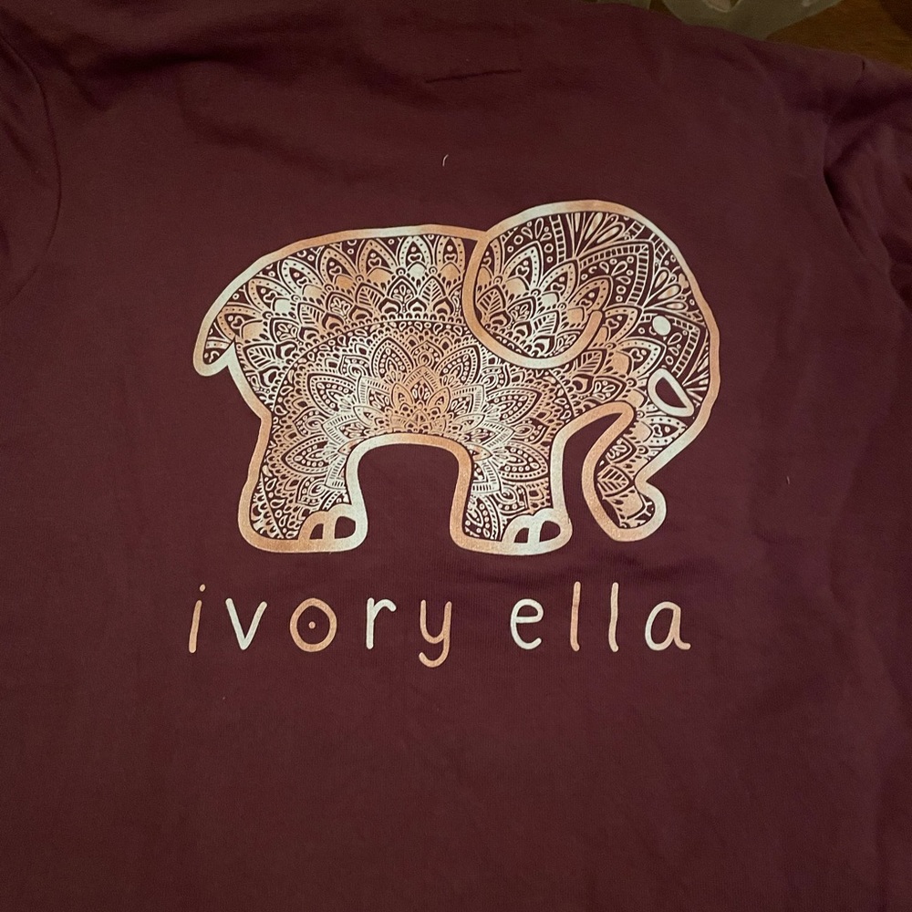 Ivory Ella size large.